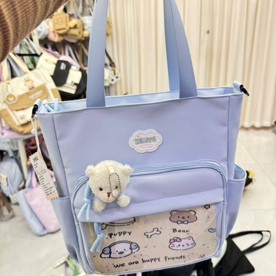 totebag of heavy material, spacious 
colours light blue, light purple