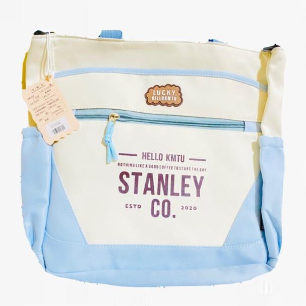 toebag- with heavy material in cream & light blue colour with a detachable strap
