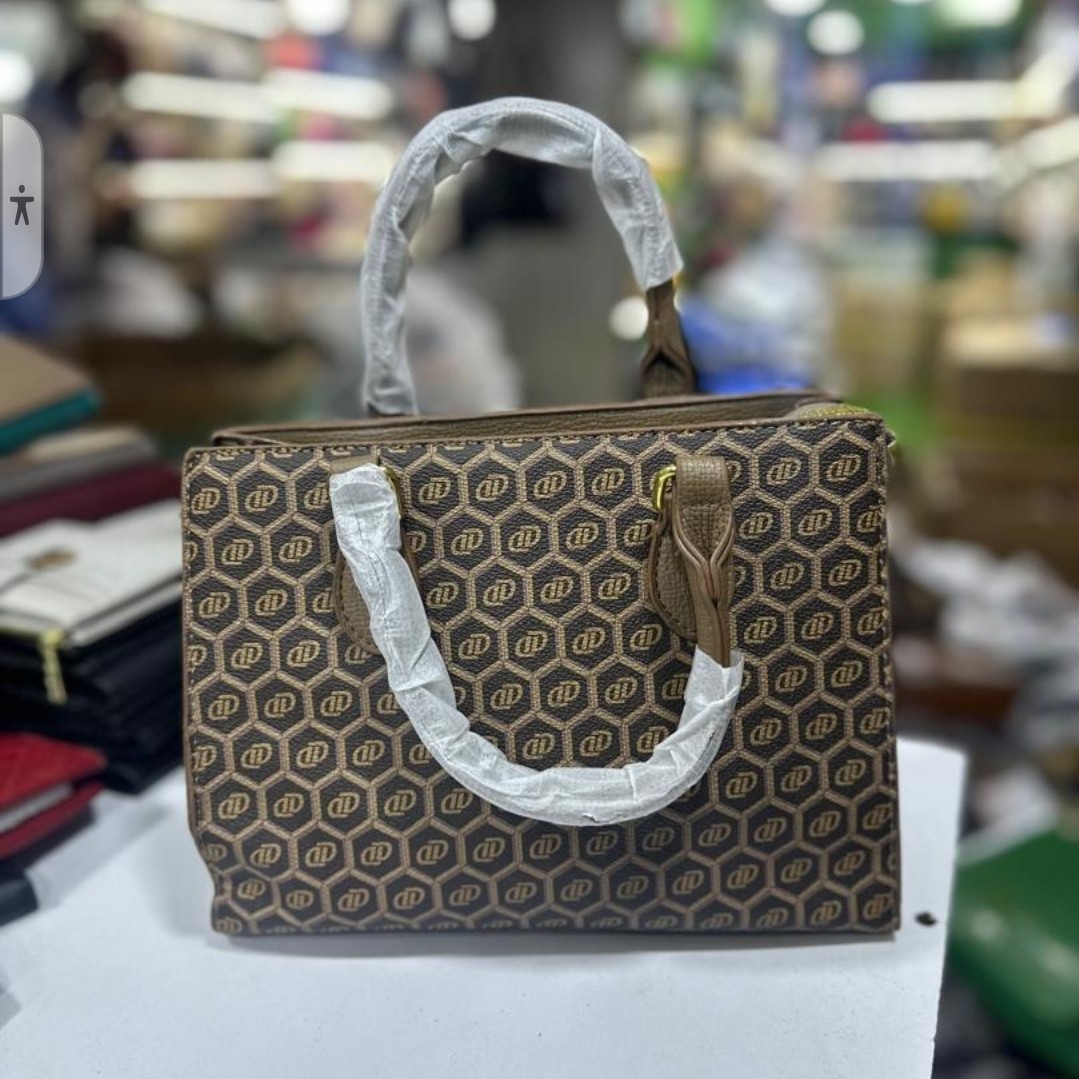 Durable  spacious shoulder bag with a detachable strap